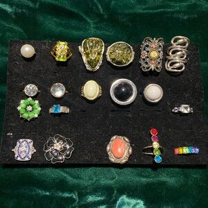 All rings costume jewelry, $20 each.